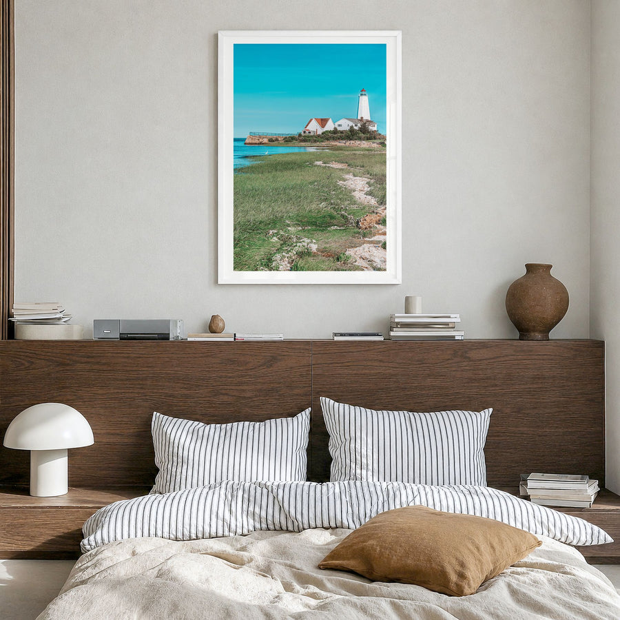 Old Saybrook Photo Poster in a white wood frame, hanging in a bedroom, white border
