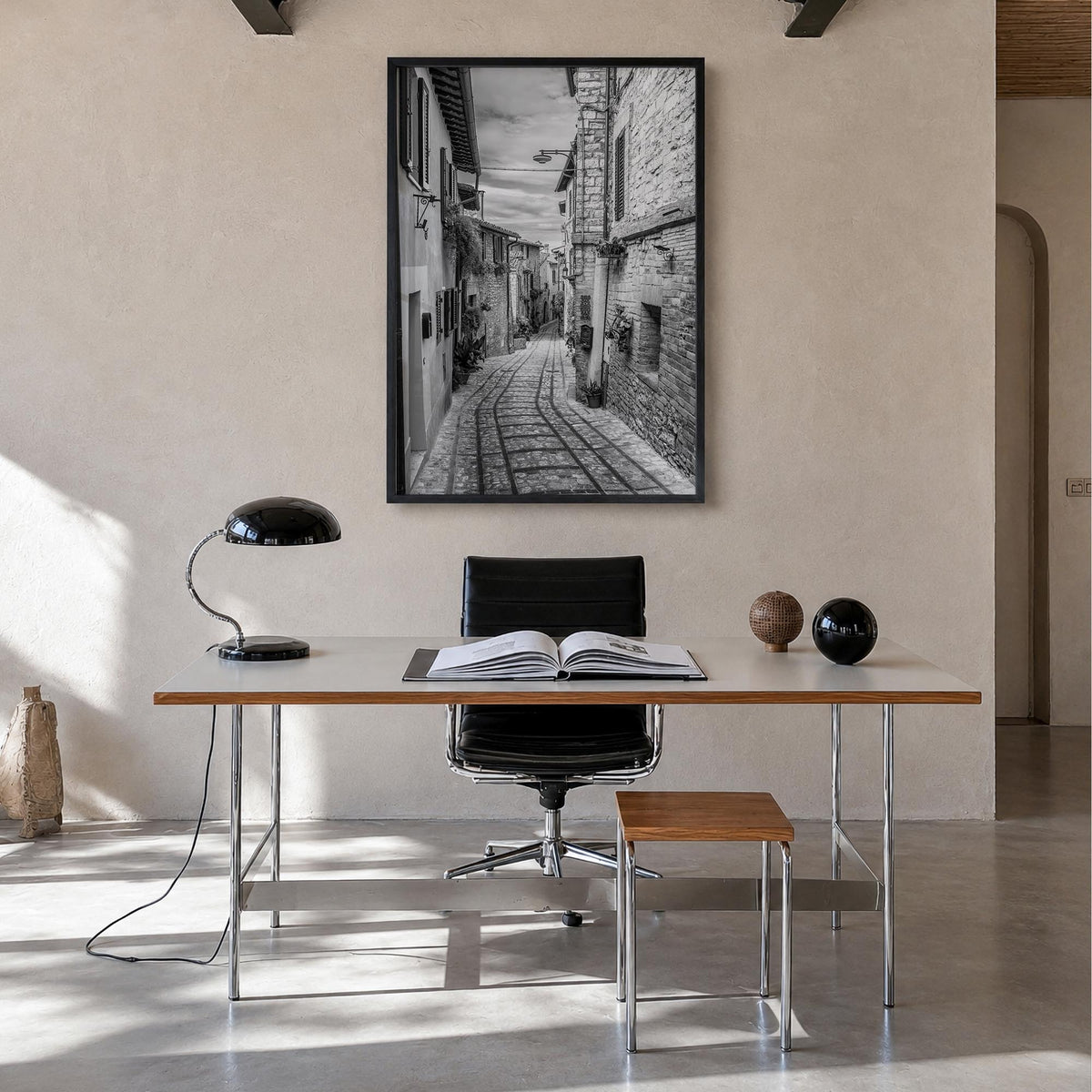 Old Town in Italy black & white photo poster – vertical wall art in black wood frame, hanging on wall