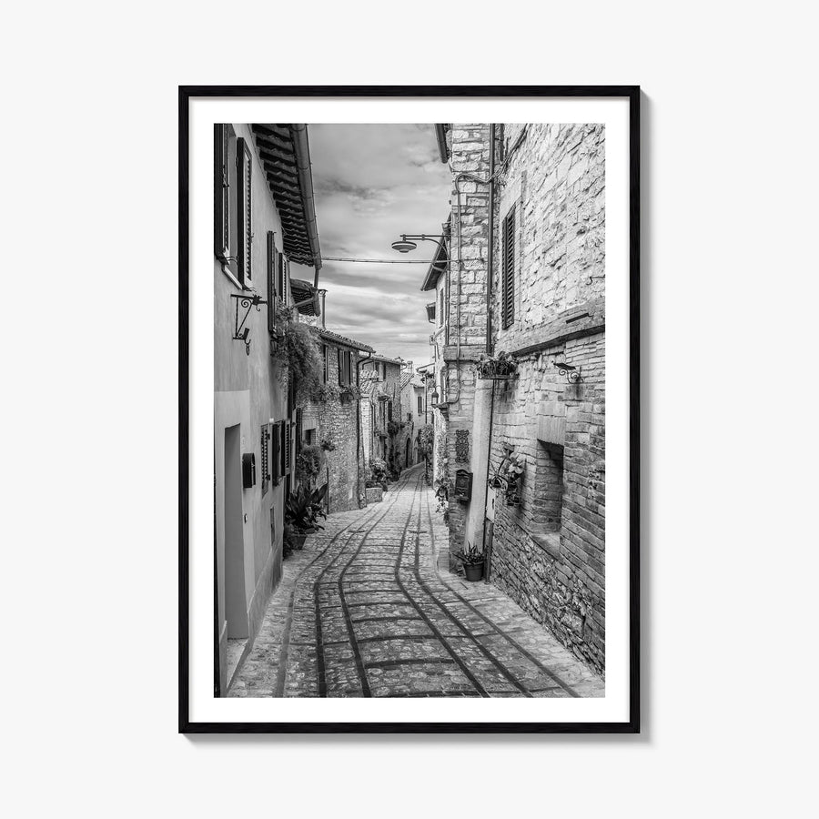 Old Town in Italy black & white photo poster – vertical wall art, unframed print shown in interior mockup