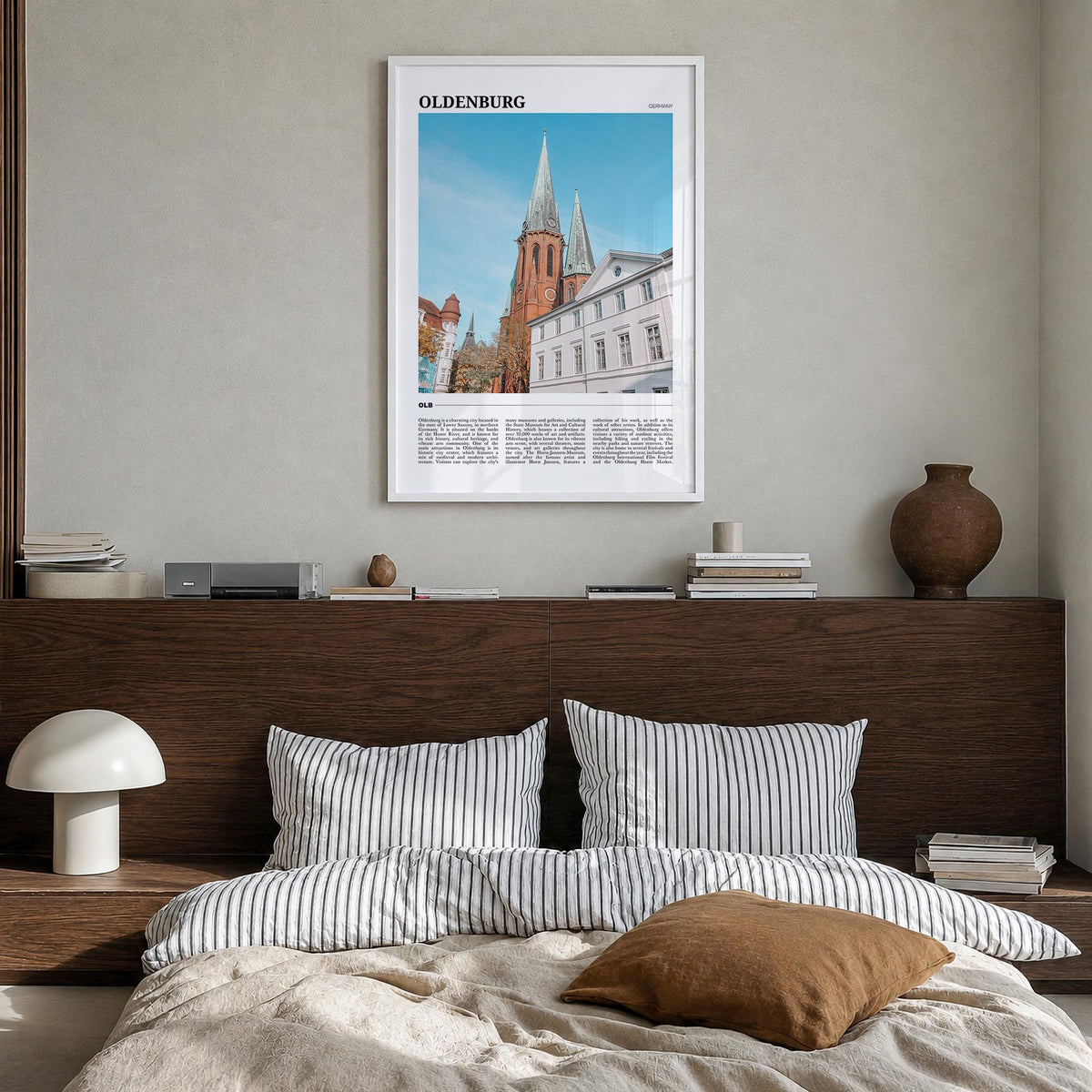 Oldenburg colorful travel poster of Germany – vertical wall art in white wood frame, hanging on wall