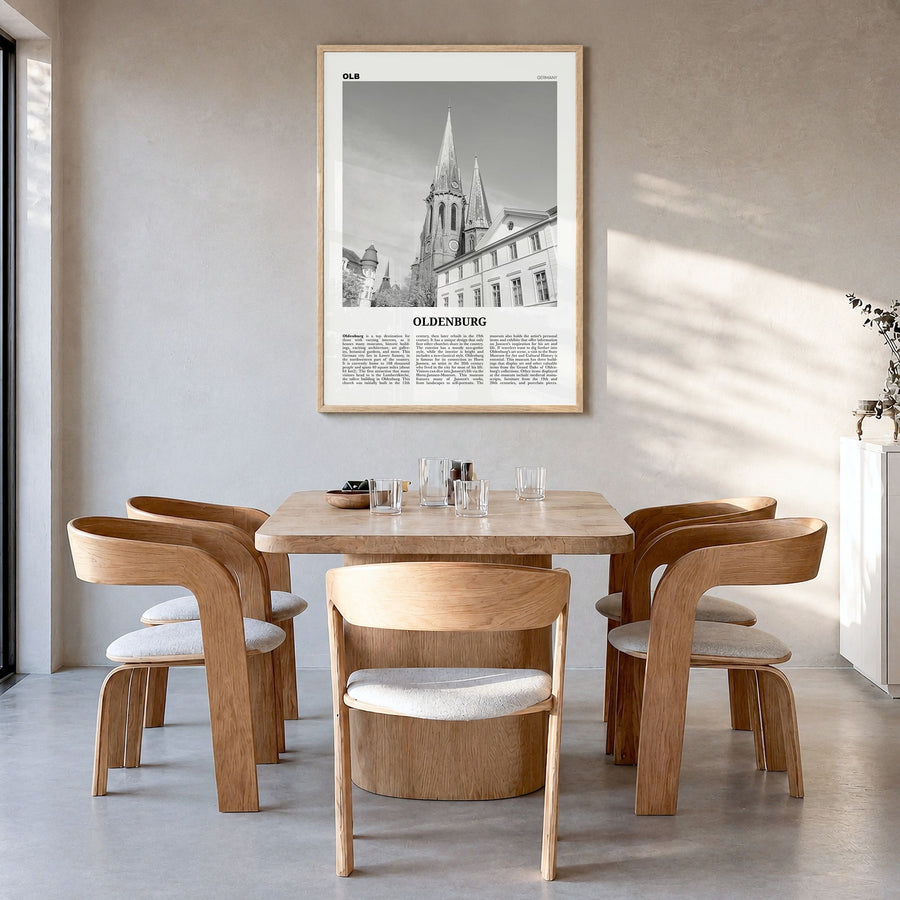 Oldenburg Newspaper Poster in a natural wood frame, hanging in a dining room