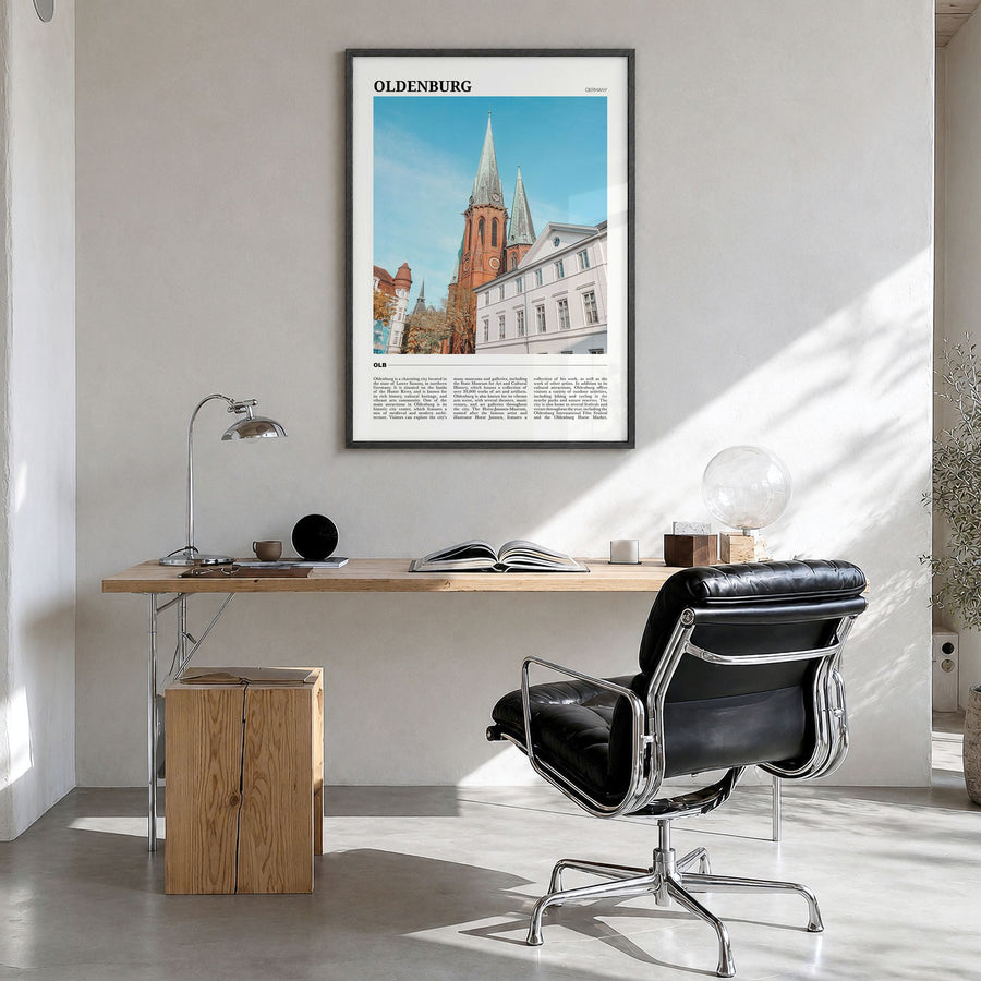 Oldenburg Travel Poster in a black wood frame, hanging in a bright home office