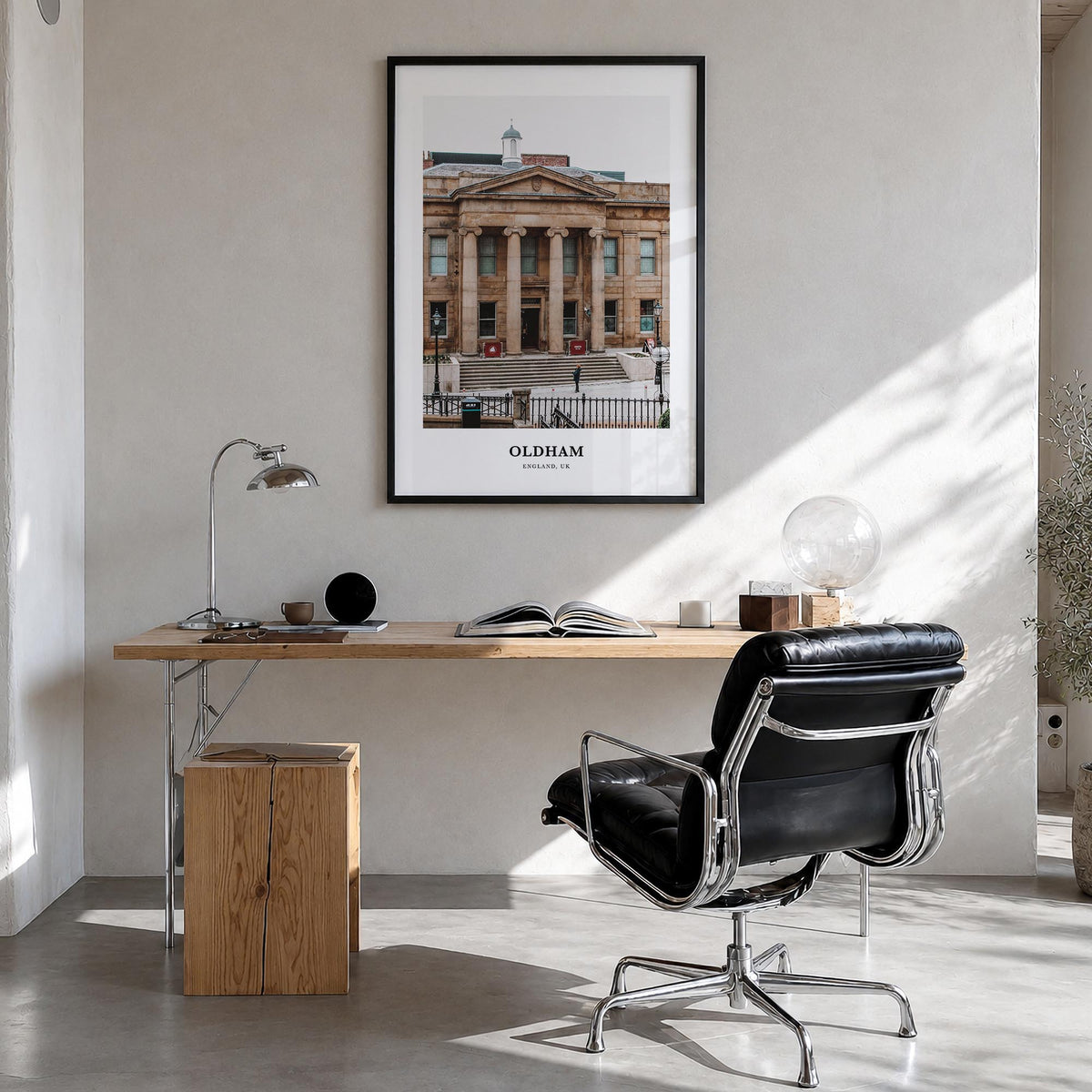 Oldham colorful classic poster of United Kingdom – vertical wall art in black wood frame, hanging on wall
