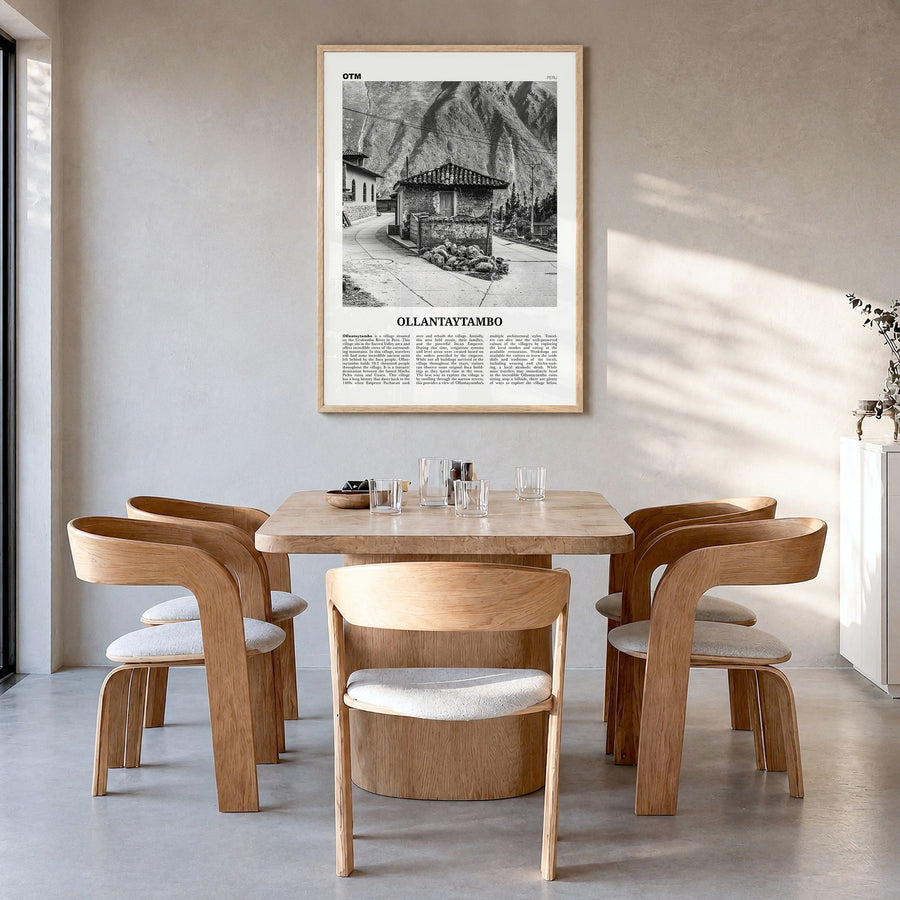 Ollantaytambo Newspaper Poster in a natural wood frame, hanging in a dining room