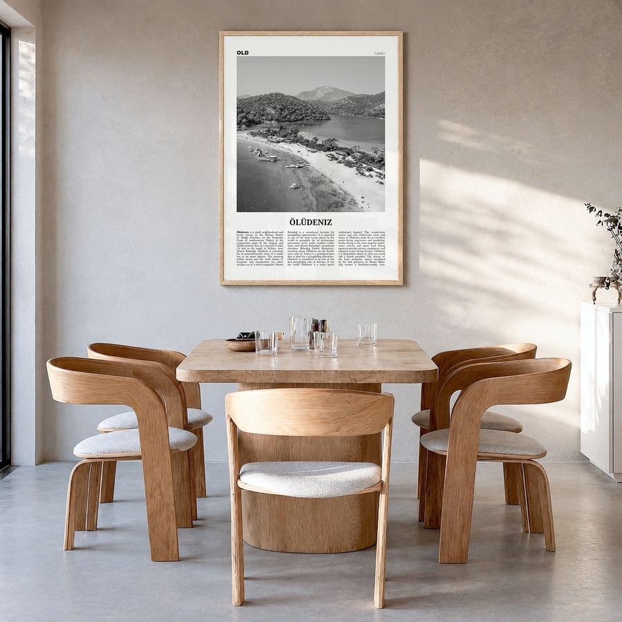Ölüdeniz Newspaper Poster in a natural wood frame, hanging in a dining room