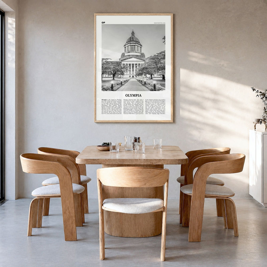 Olympia Newspaper No 1 Poster in a natural wood frame, hanging in a dining room