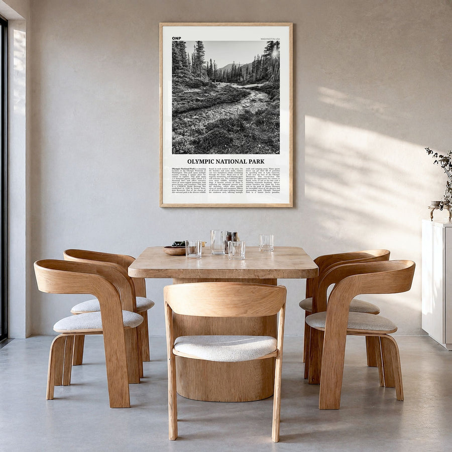 Olympic National Park Newspaper Poster in a natural wood frame, hanging in a dining room
