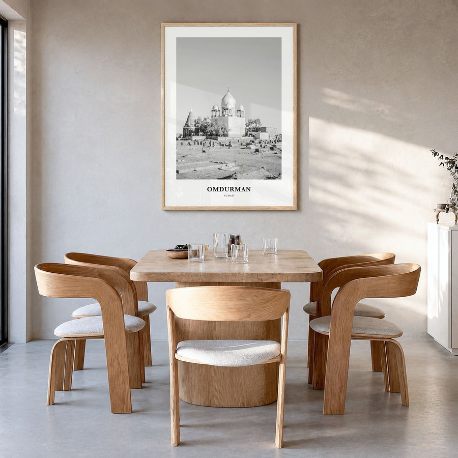 Omdurman Classic Poster in a natural wood frame, hanging in a dining room