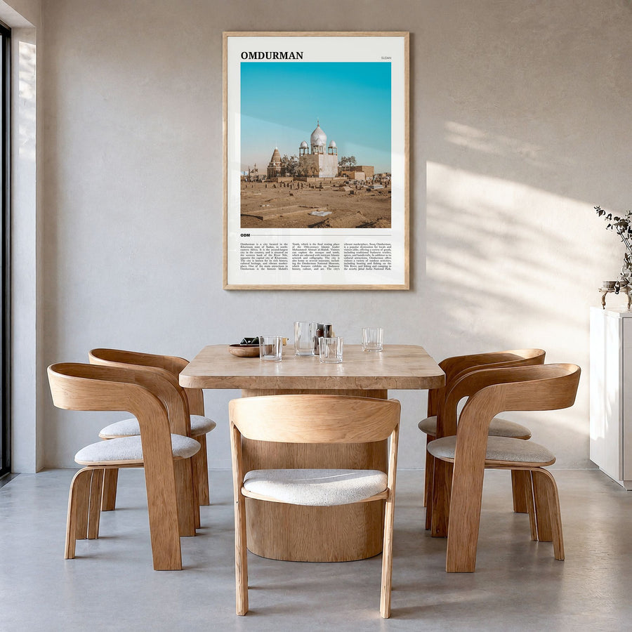 Omdurman Travel Poster in a natural wood frame, hanging in a dining room