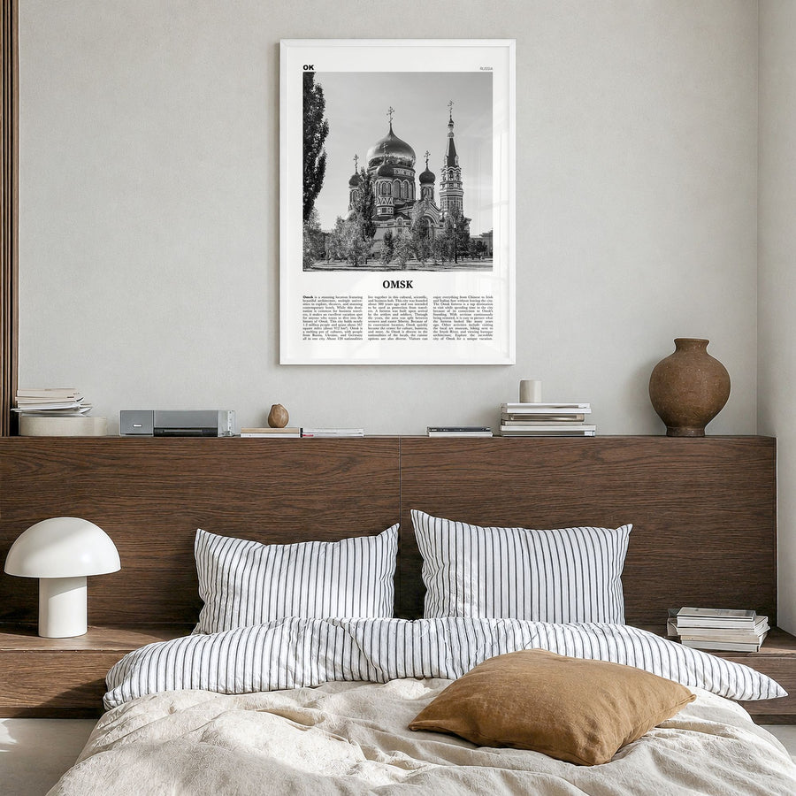 Omsk Newspaper Poster in a white wood frame, hanging in a bedroom