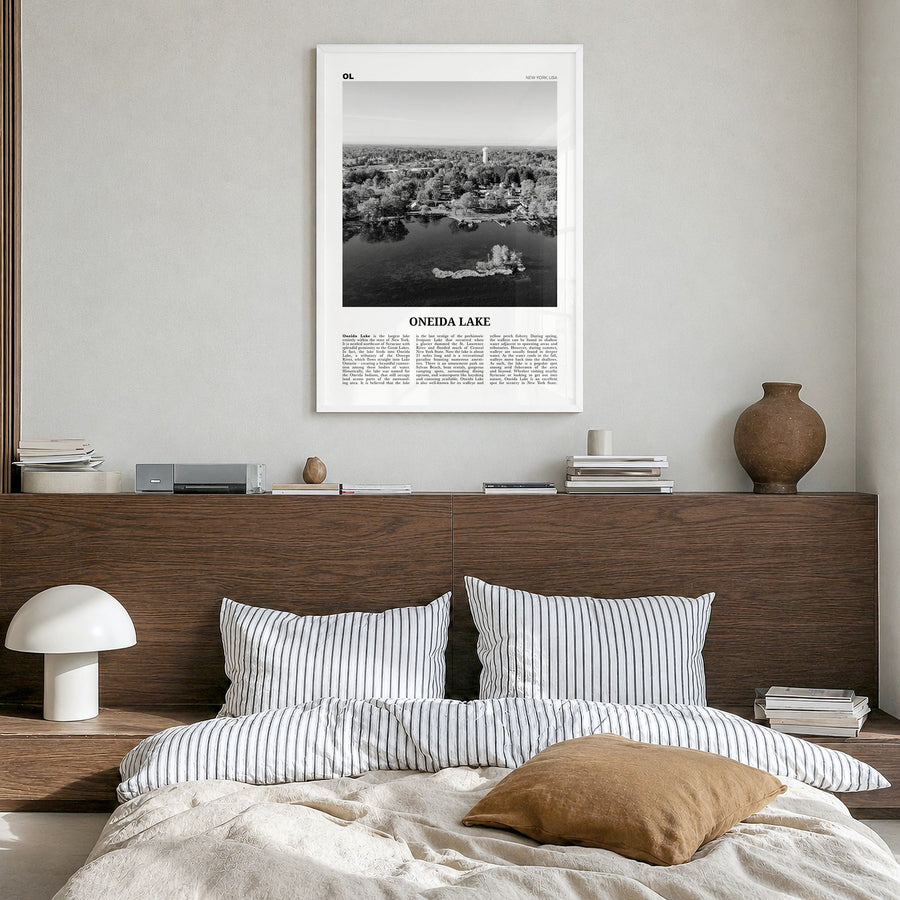 Oneida Lake Newspaper Poster in a white wood frame, hanging in a bedroom