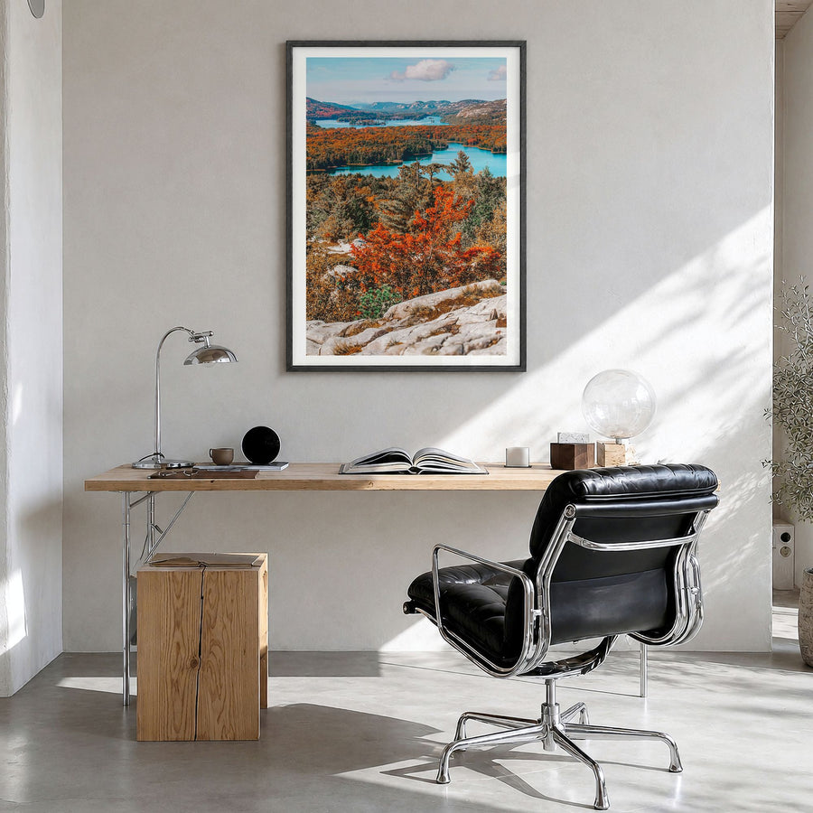 Ontario Photo Poster in a black wood frame, hanging in a bright home office, white border