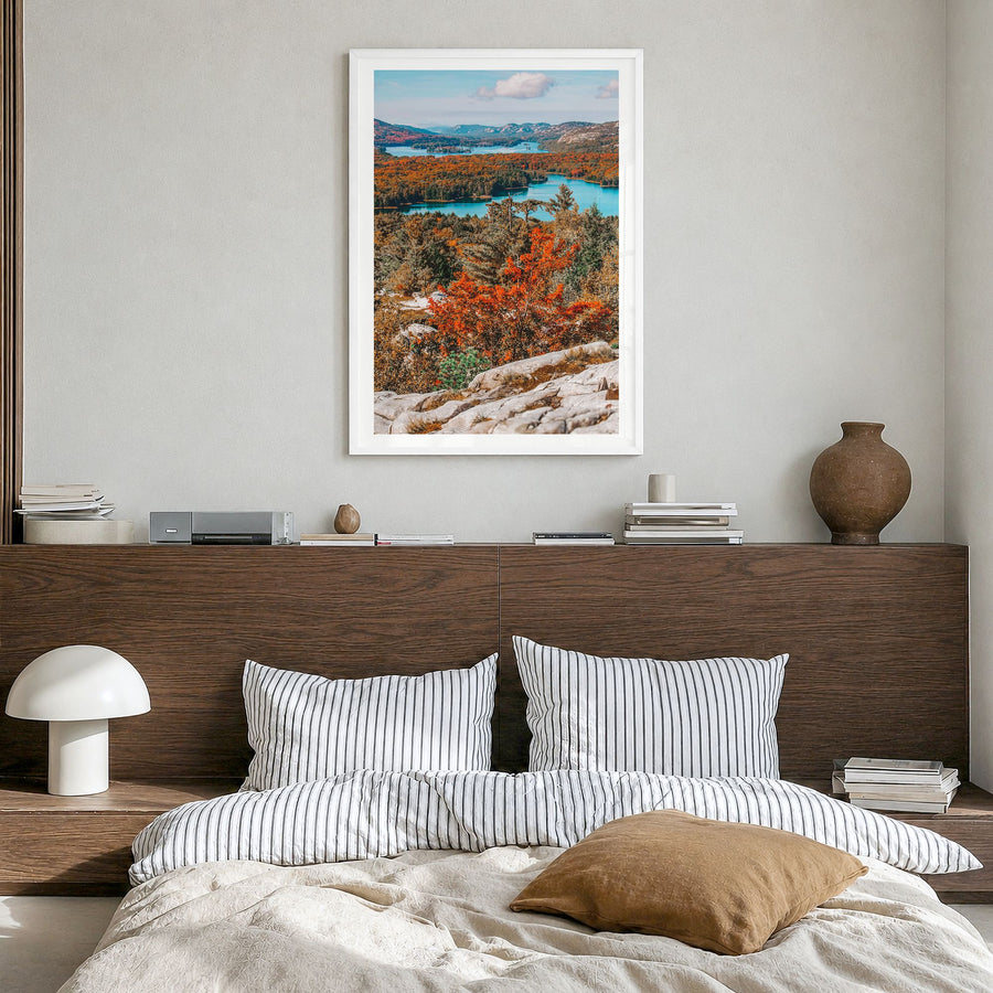 Ontario Photo Poster in a white wood frame, hanging in a bedroom, white border