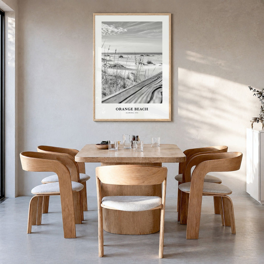 Orange Beach Classic Poster in a natural wood frame, hanging in a dining room