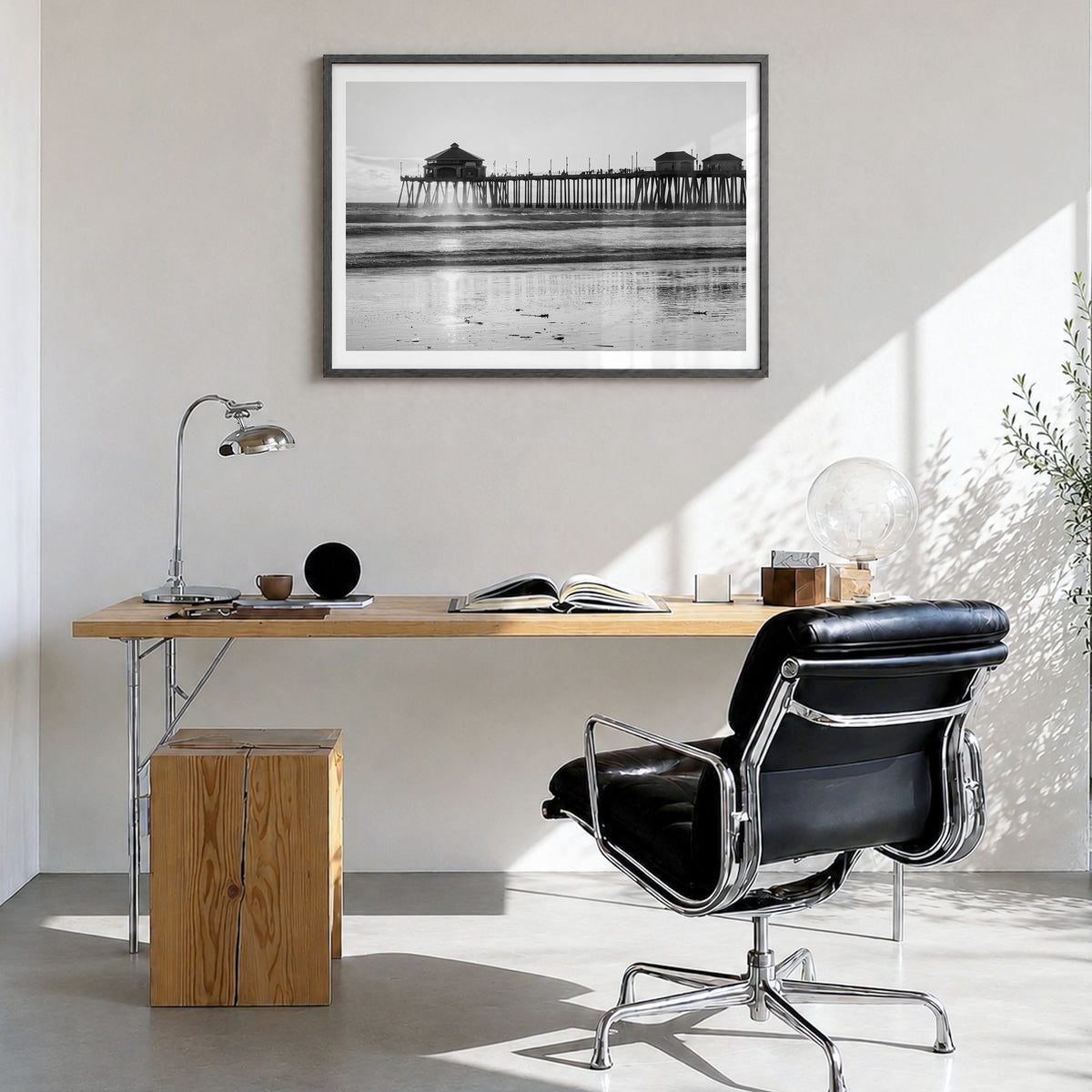 Orange County Photo Poster in a black wood frame, hanging in a bright home office, white border