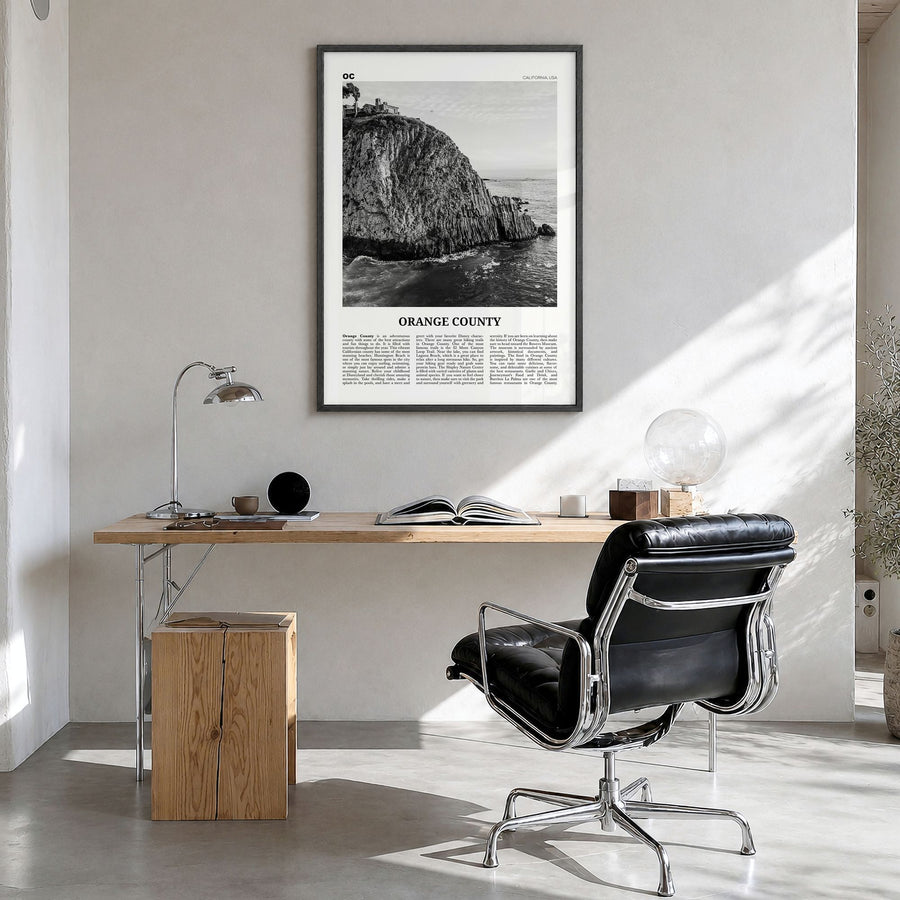 Orange County Newspaper No 2 Poster in a black wood frame, hanging in a bright home office