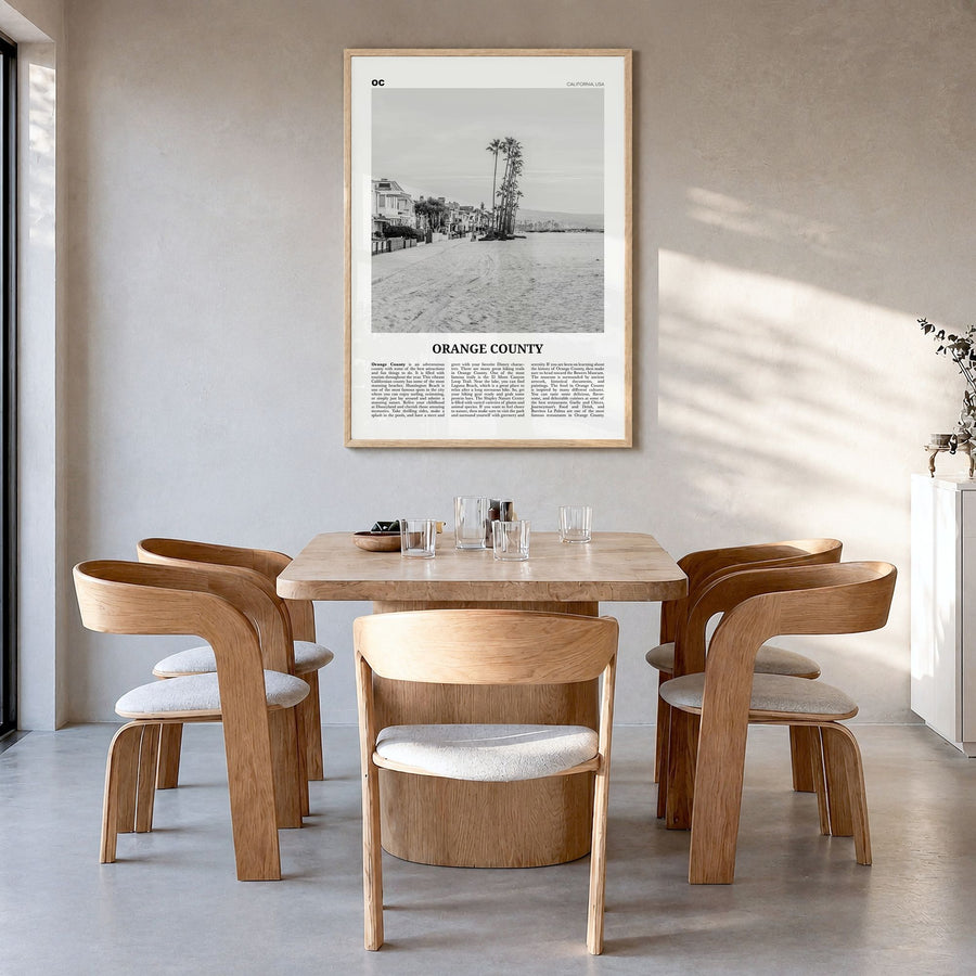 Orange County Newspaper No 4 Poster in a natural wood frame, hanging in a dining room