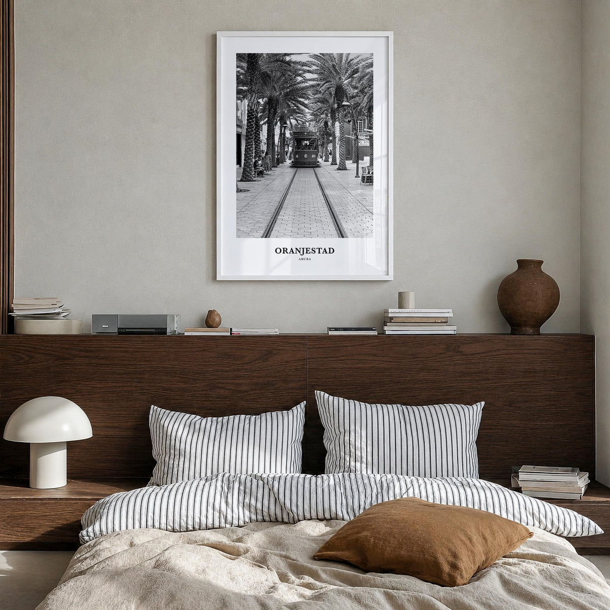 Oranjestad black & white classic poster of Aruba – vertical wall art in white wood frame, hanging on wall
