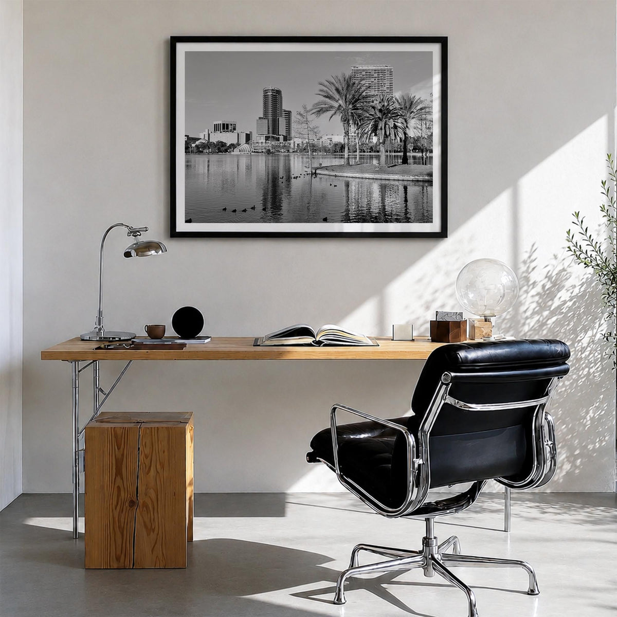 Orlando black & white photo poster of Florida, USA – horizontal wall art in black wood frame with white border, hanging on wa