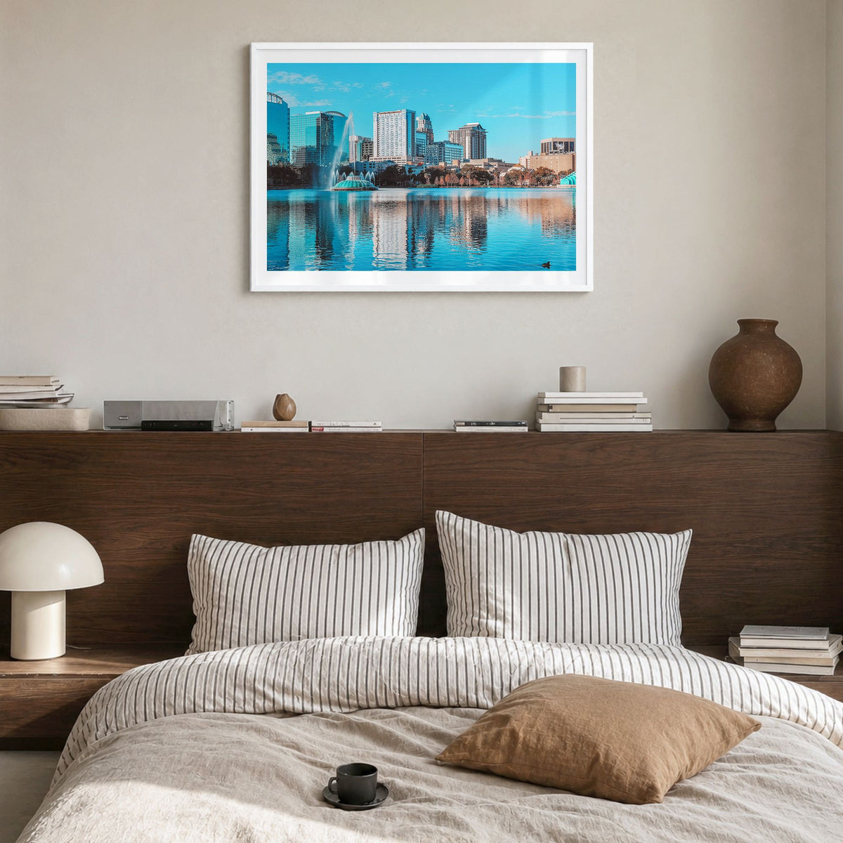 Orlando Photo Poster in a white wood frame, hanging in a bedroom, white border