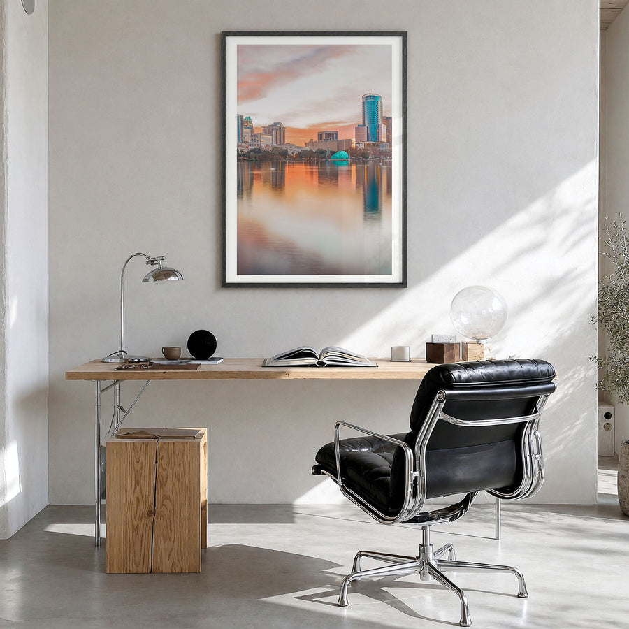 Orlando Photo No 1 Poster in a black wood frame, hanging in a bright home office, white border