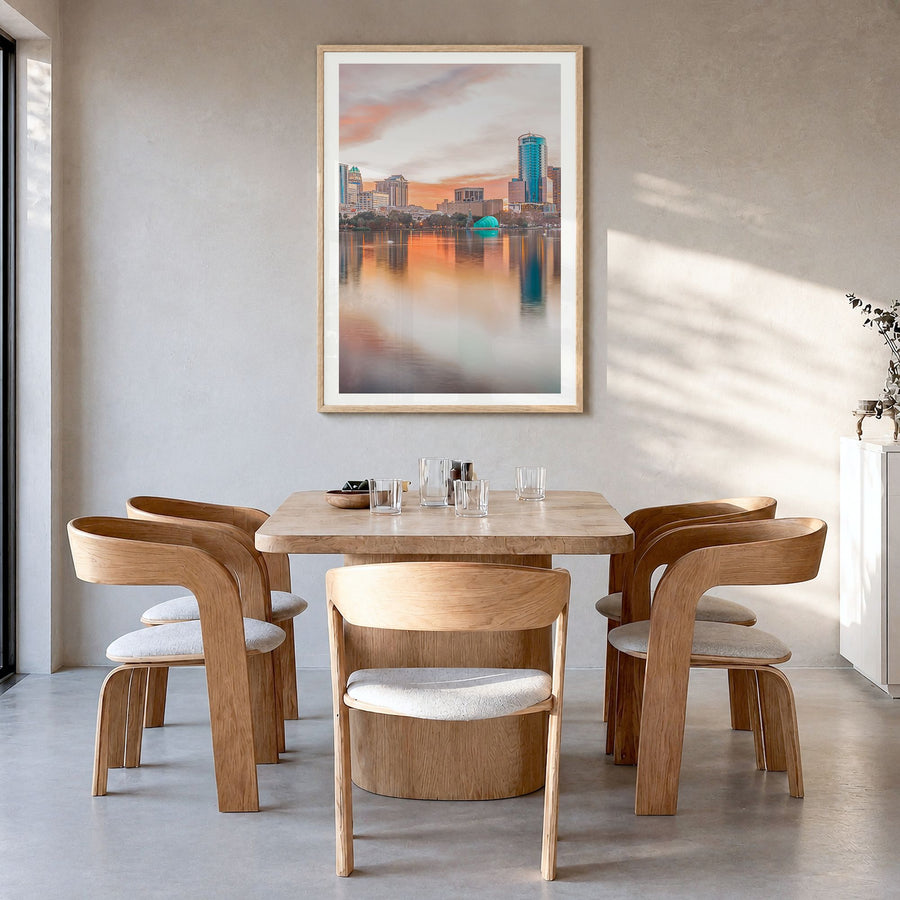 Orlando Photo No 1 Poster in a natural wood frame, hanging in a dining room, white border