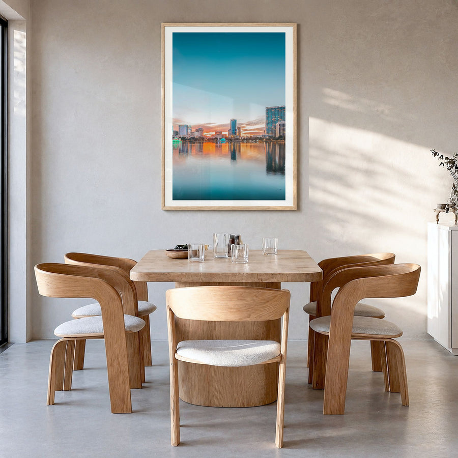 Orlando Photo No 2 Poster in a natural wood frame, hanging in a dining room, white border