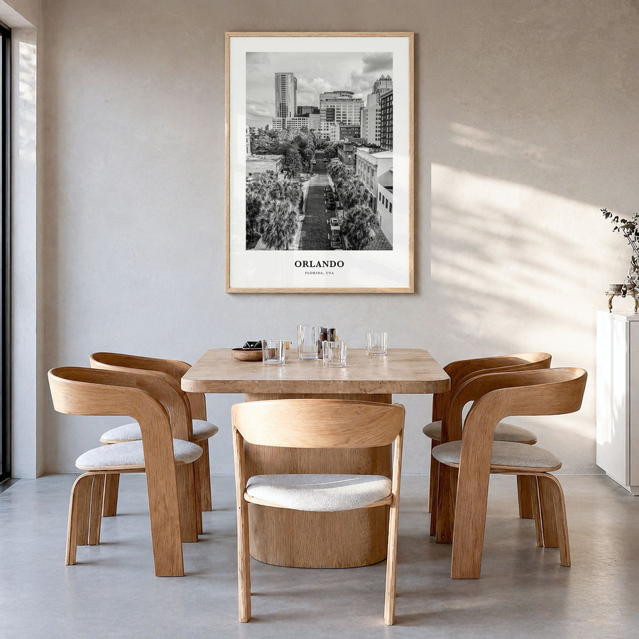 Orlando Classic No 1 Poster in a natural wood frame, hanging in a dining room