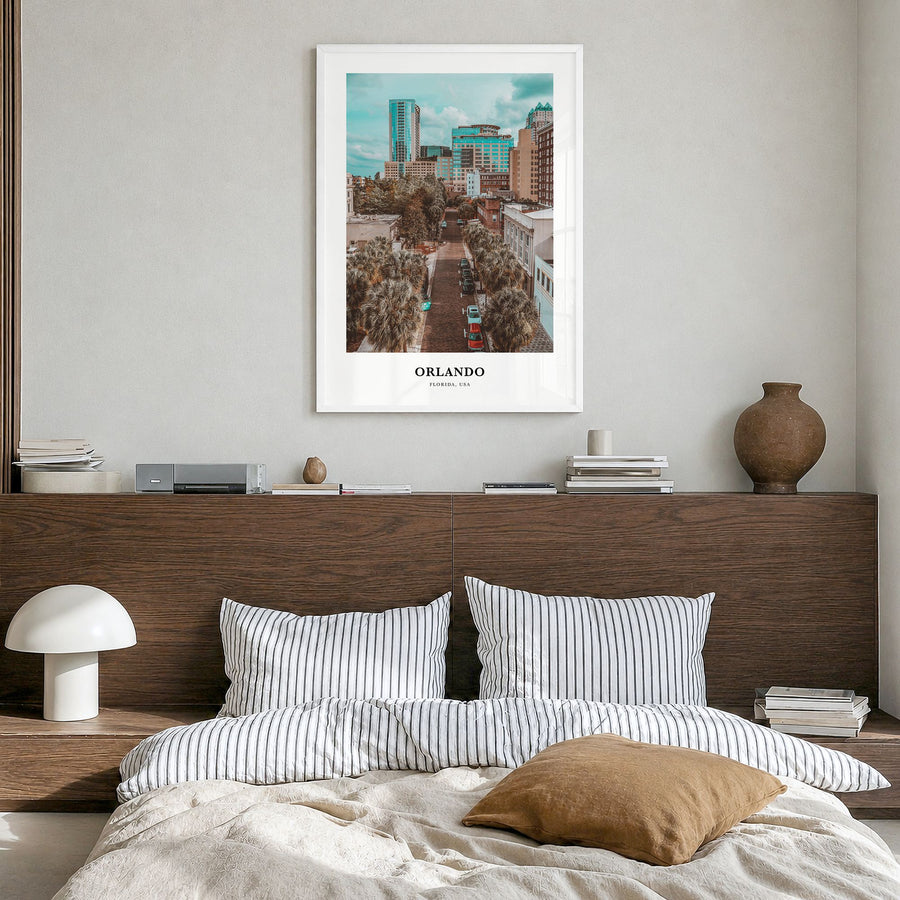 Orlando Classic No 1 Poster in a white wood frame, hanging in a bedroom