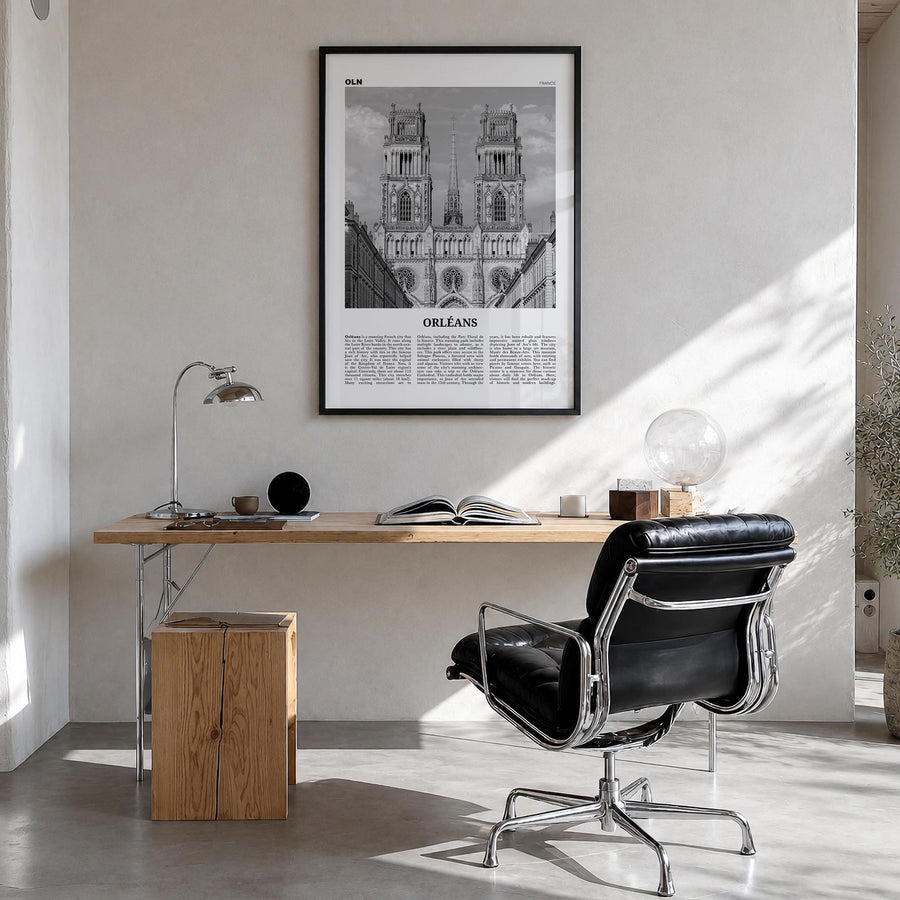 Orléans black & white newspaper poster of France – vertical wall art in black wood frame, hanging on wall