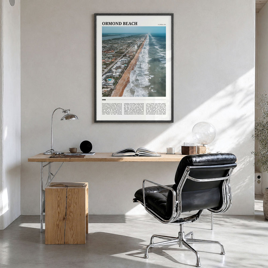 Ormond Beach Travel Poster in a black wood frame, hanging in a bright home office