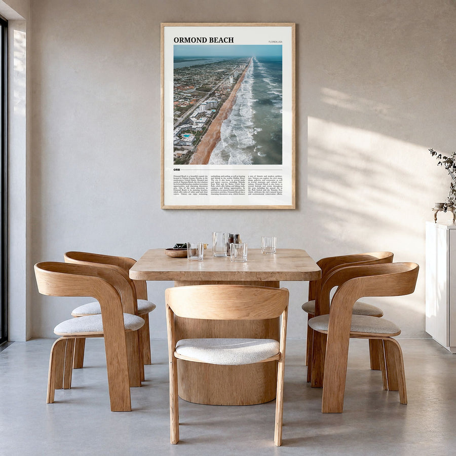 Ormond Beach Travel Poster in a natural wood frame, hanging in a dining room