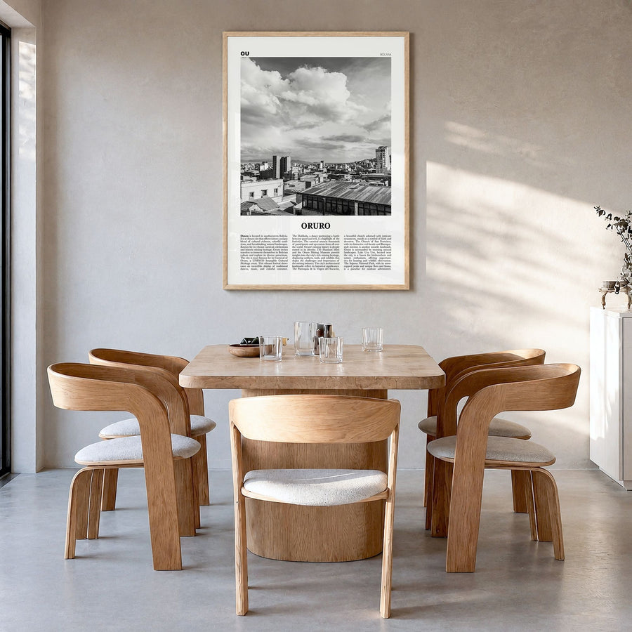 Oruro Newspaper Poster in a natural wood frame, hanging in a dining room