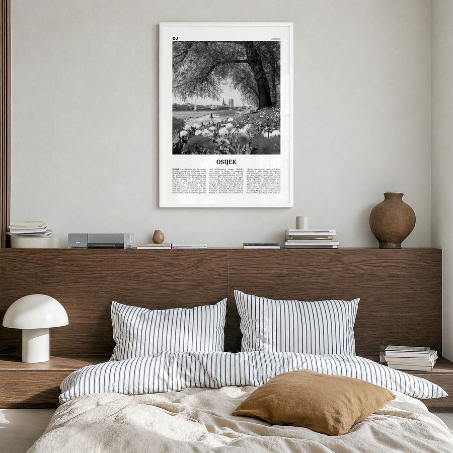 Osijek Newspaper Poster in a white wood frame, hanging in a bedroom