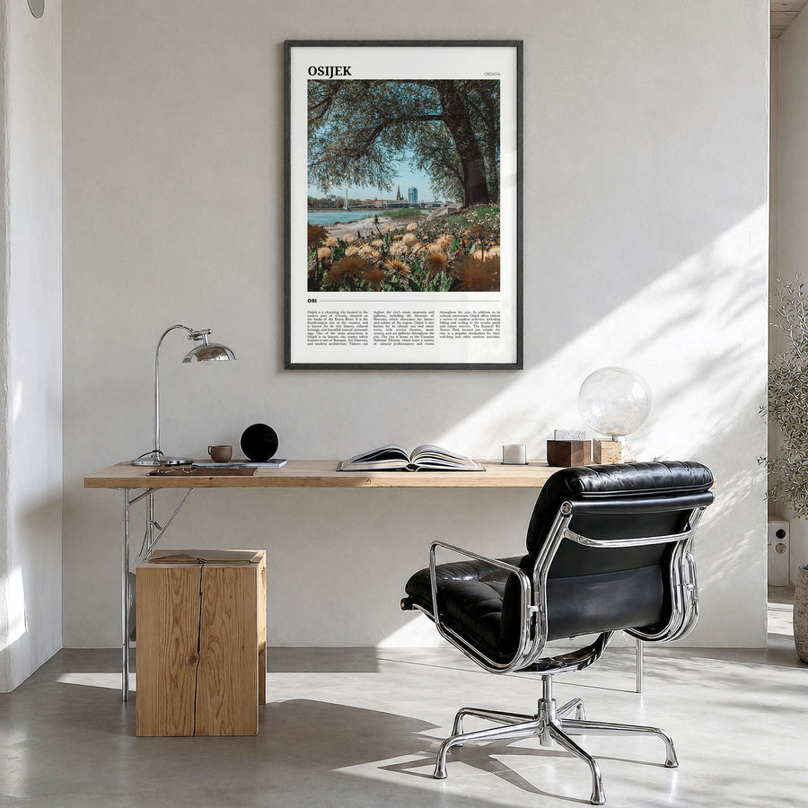 Osijek Travel Poster in a black wood frame, hanging in a bright home office