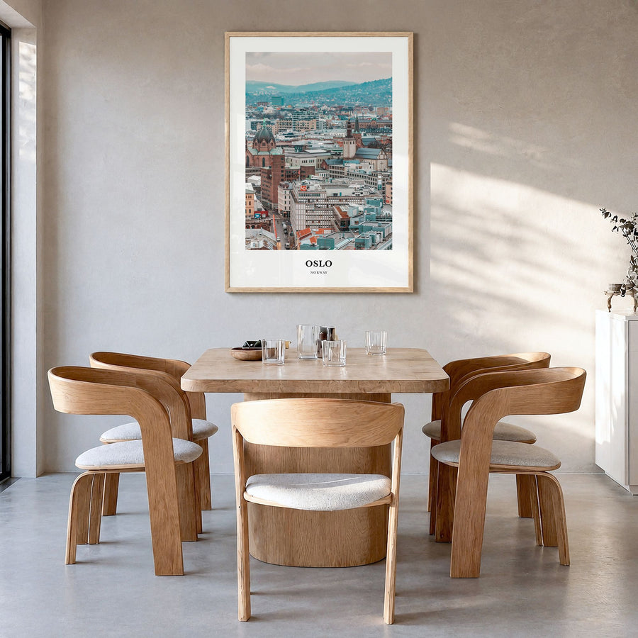 Oslo Classic Poster in a natural wood frame, hanging in a dining room