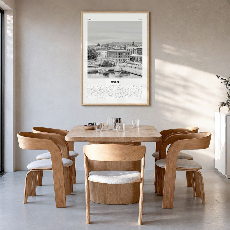 Oslo Newspaper No 1 Poster in a natural wood frame, hanging in a dining room