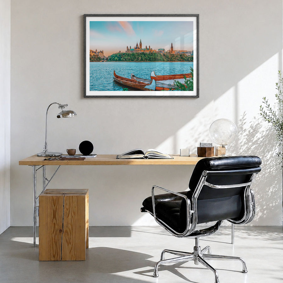 Ottawa Photo Poster in a black wood frame, hanging in a bright home office, white border