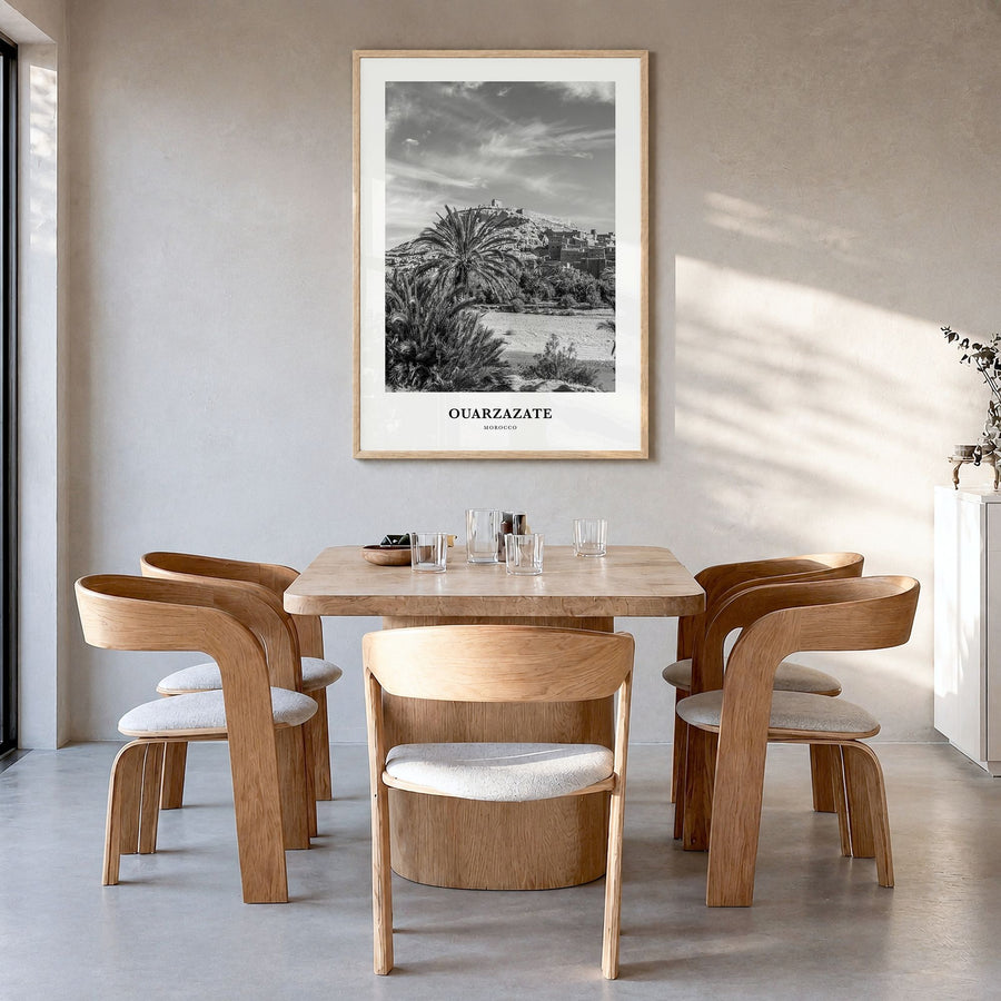 Ouarzazate Classic Poster in a natural wood frame, hanging in a dining room
