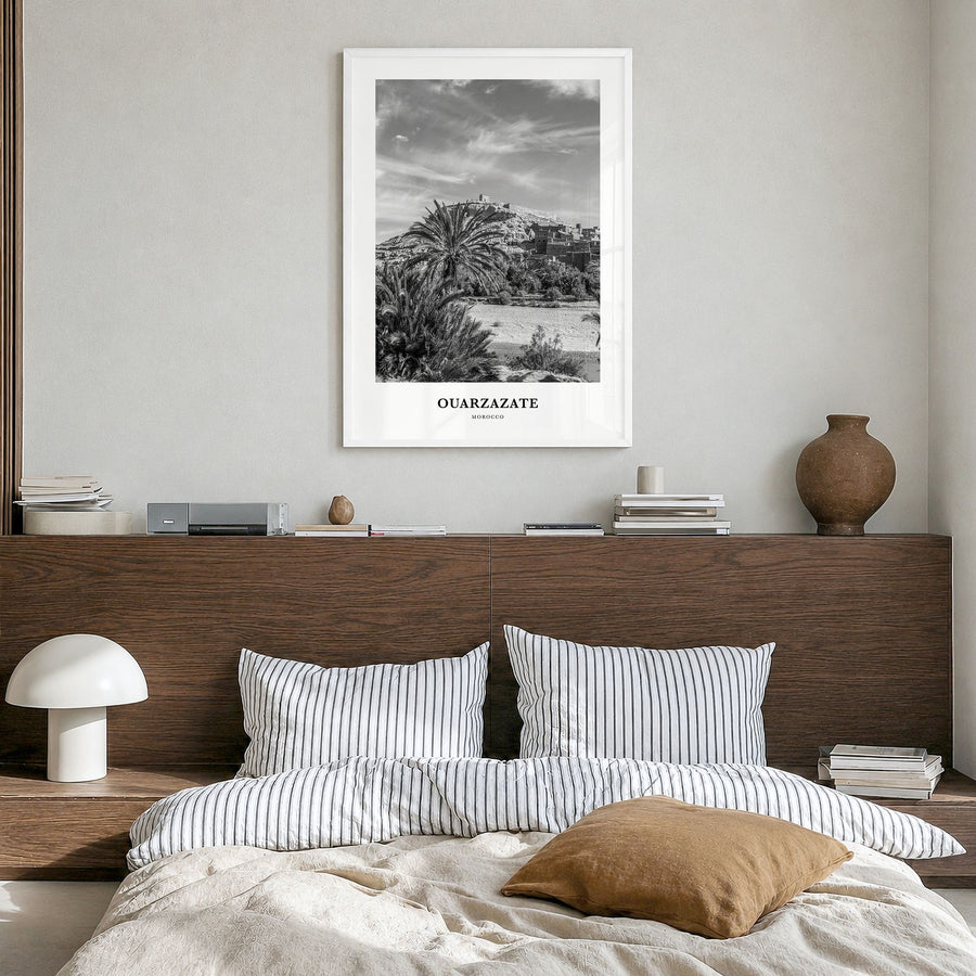 Ouarzazate Classic Poster in a white wood frame, hanging in a bedroom