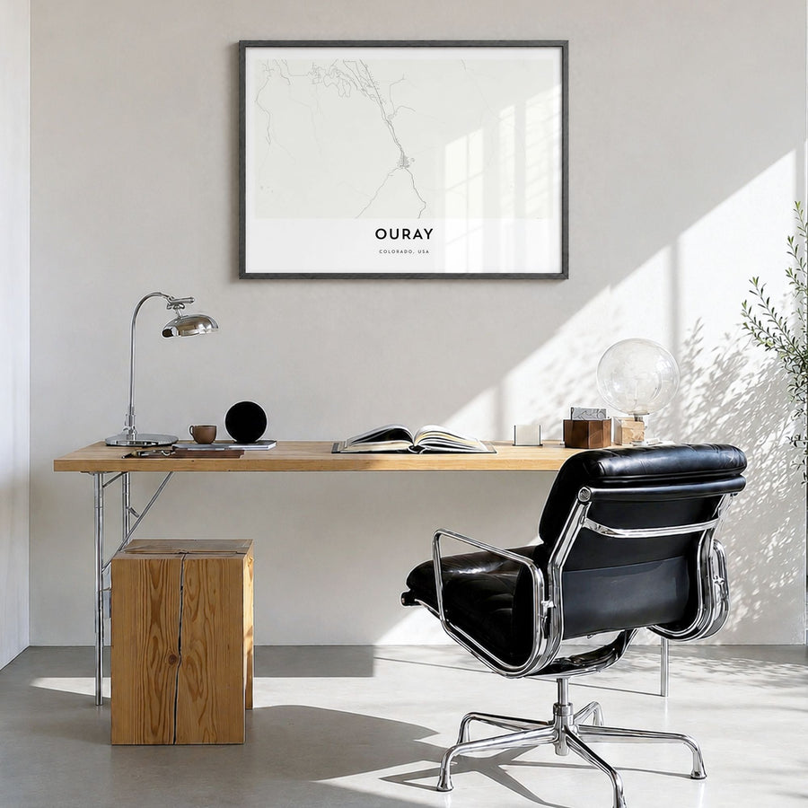 Ouray Map Poster in a black wood frame, hanging in a bright home office