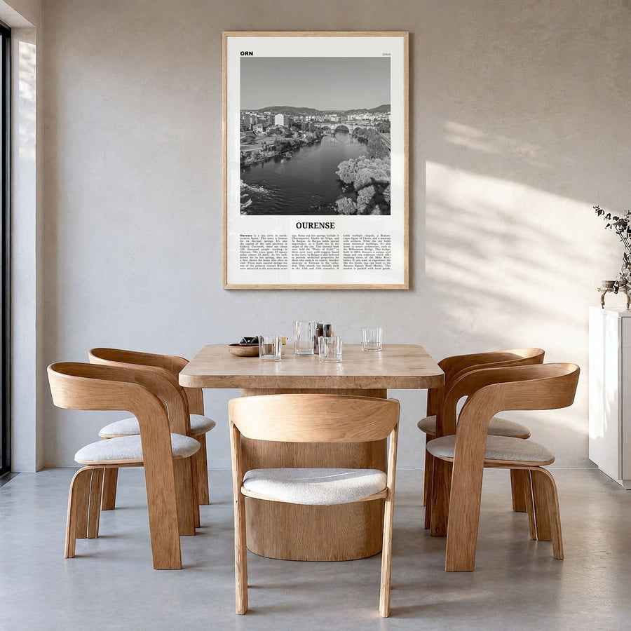 Ourense Newspaper Poster in a natural wood frame, hanging in a dining room