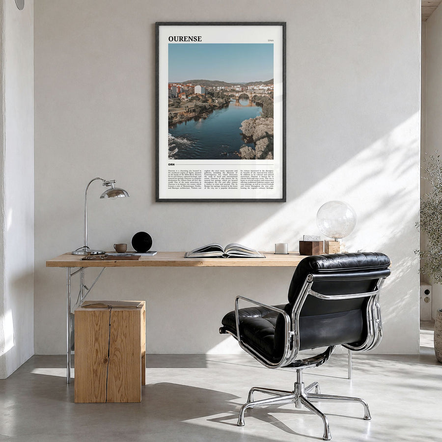 Ourense Travel Poster in a black wood frame, hanging in a bright home office