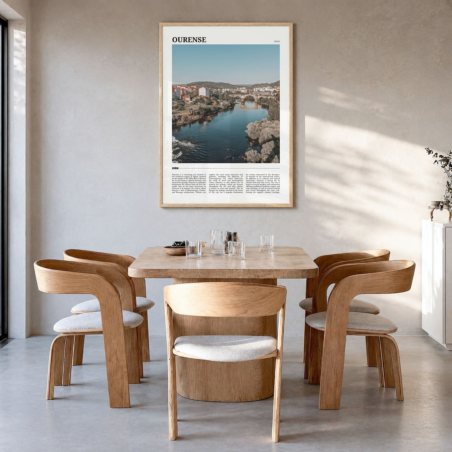 Ourense Travel Poster in a natural wood frame, hanging in a dining room