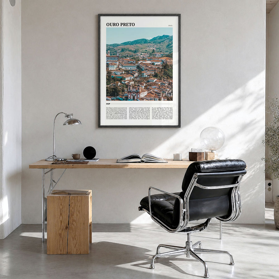 Ouro Preto Travel Poster in a black wood frame, hanging in a bright home office
