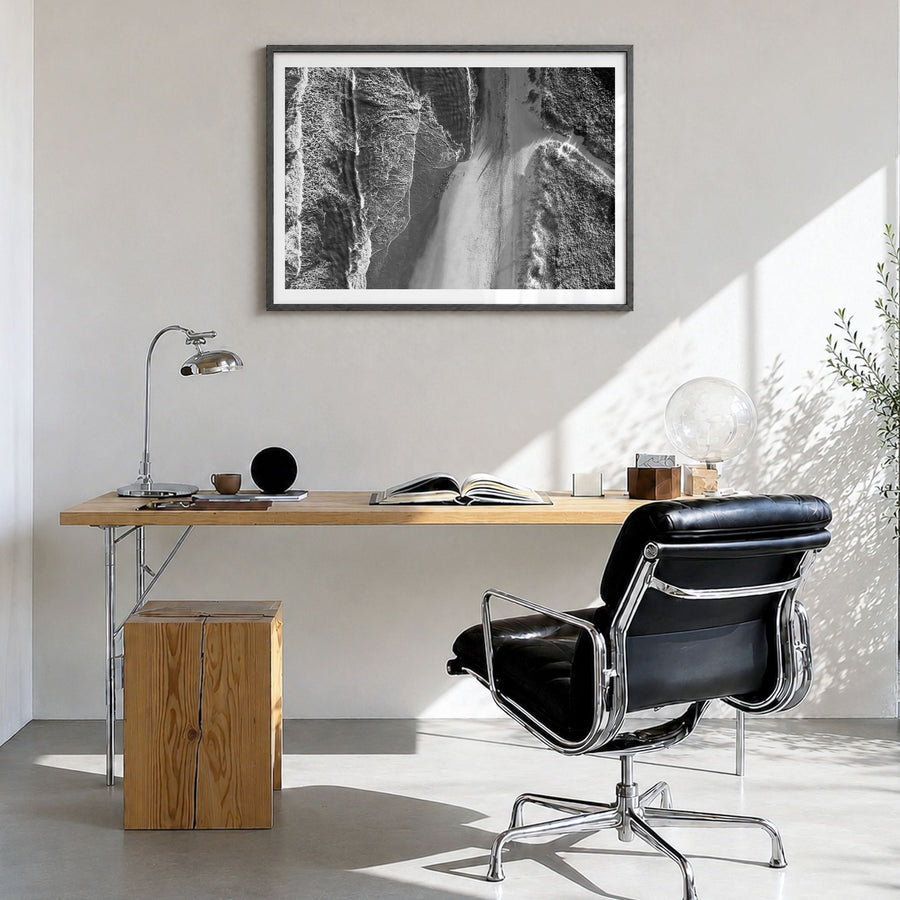 Outer Banks Photo Poster in a black wood frame, hanging in a bright home office, white border