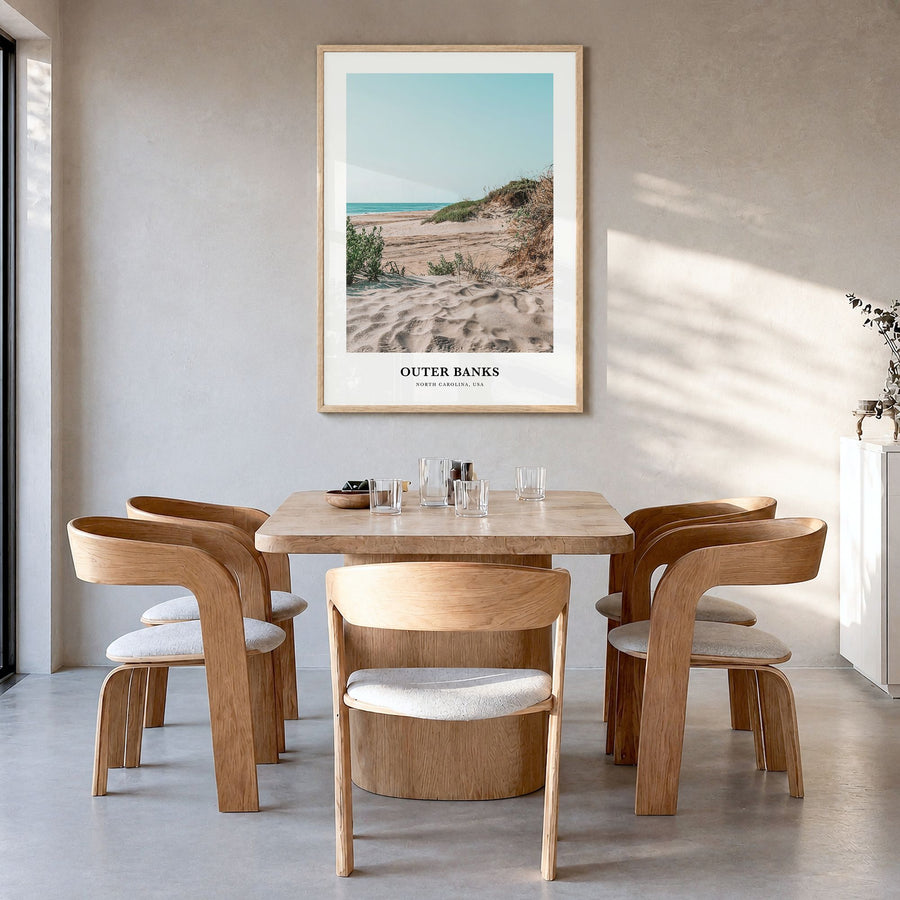 Outer Banks Classic Poster in a natural wood frame, hanging in a dining room