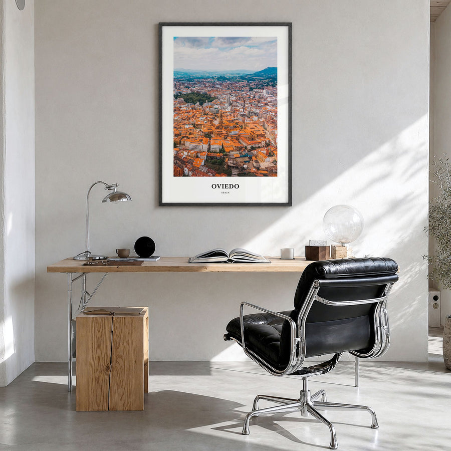 Oviedo Classic Poster in a black wood frame, hanging in a bright home office