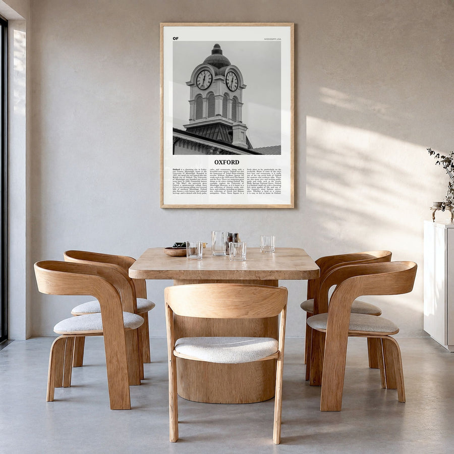 Oxford, Mississippi Newspaper Poster in a natural wood frame, hanging in a dining room