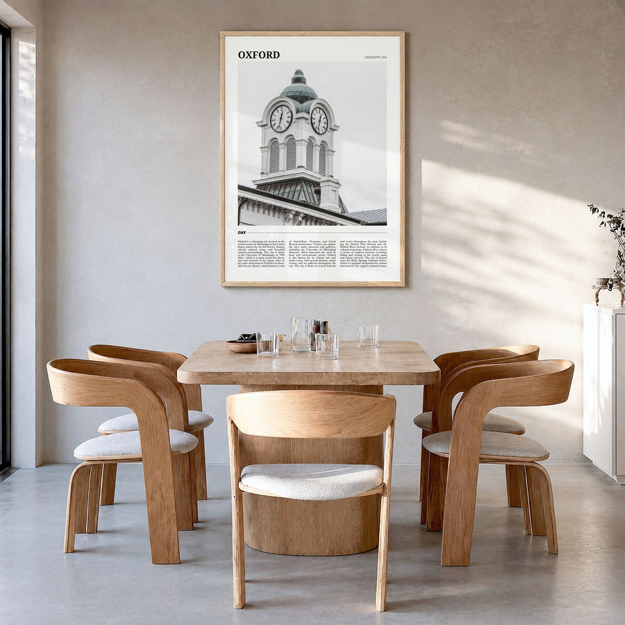 Oxford, Mississippi Travel Poster in a natural wood frame, hanging in a dining room